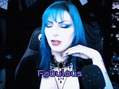 A Woman With Blue Hair Has The Word Fabulous In Purple GIF