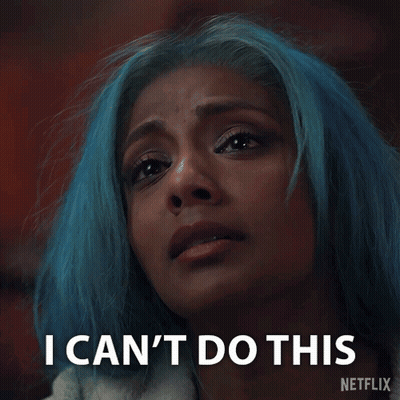 A Woman With Blue Hair Is Crying With The Words " Without You " Behind Her GIF