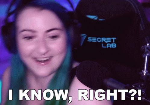 A Woman With Blue Hair Is Sitting In Front Of A Secret Lab Chair GIF