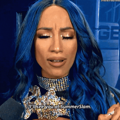 A Woman With Blue Hair Is Talking Into A Microphone And Says " I 'Ll See You At Summerslam " GIF