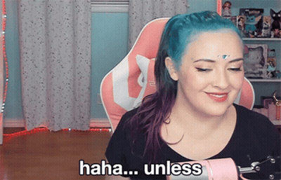 A Woman With Blue Hair Says " Haha Unless " In Front Of A Pink Microphone GIF