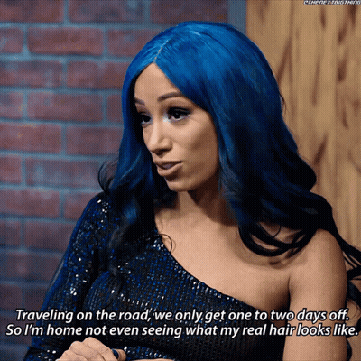A Woman With Blue Hair Says Travelling On The Road We Only Get One To Two Days Off GIF