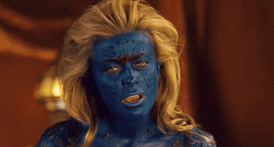A Woman With Blue Paint On Her Face GIF