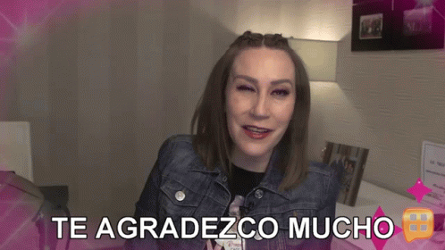 A Woman With Braces On Her Te Agradezco Mucho Sign GIF