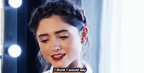 A Woman With Braided Hair And Red Lipstick Says I Think I Would Say . GIF