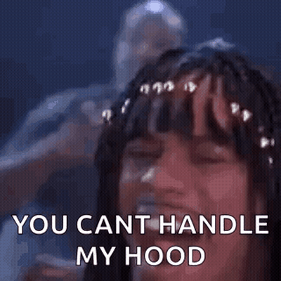 A Woman With Braids In Her Hair Is Laughing And Saying `` You Cant Handle My Hood '' . GIF