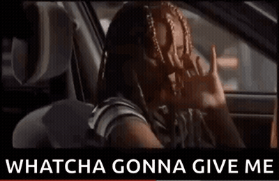 A Woman With Braids Is Sitting In A Car With The Words `` Whatcha Gonna Give Me '' Written On The Bottom . GIF