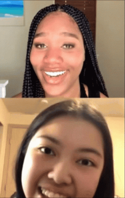 A Woman With Braids Is Smiling Next To Another Woman With Dark Hair GIF