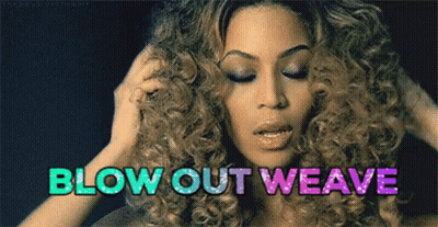 A Woman With Curly Hair Is Holding Her Hair And The Words Blow Out Weave Are Above Her Head . GIF