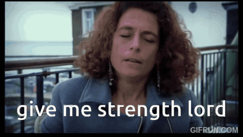 A Woman With Curly Hair Is Praying With The Words Give Me Strength Lord Below Her GIF