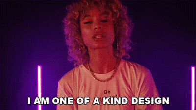 A Woman With Curly Hair Is Saying I Am One Of A Kind Design . GIF