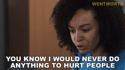 A Woman With Curly Hair Is Saying " You Know I Would Never Do Anything To Hurt People " GIF