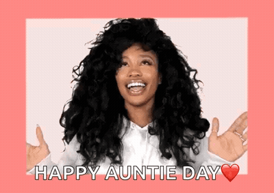 A Woman With Curly Hair Is Smiling And Holding Her Hands Out In Front Of Her Face . GIF