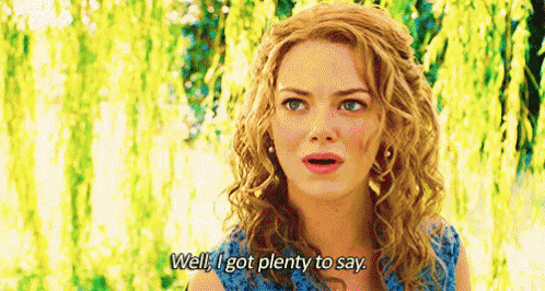 A Woman With Curly Hair Is Standing In Front Of A Tree And Saying `` Well , I Got Plenty To Say '' . GIF