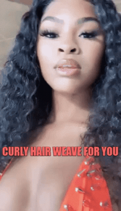 A Woman With Curly Hair Is Wearing A Red Top And A Caption That Says Curly Hair Weave For You . GIF