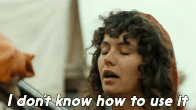 A Woman With Curly Hair Says " I Don 'T Know How To Use It " GIF