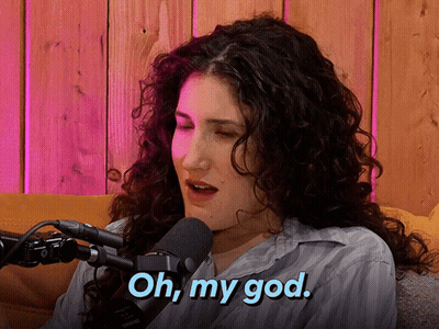A Woman With Curly Hair Says Oh My God GIF