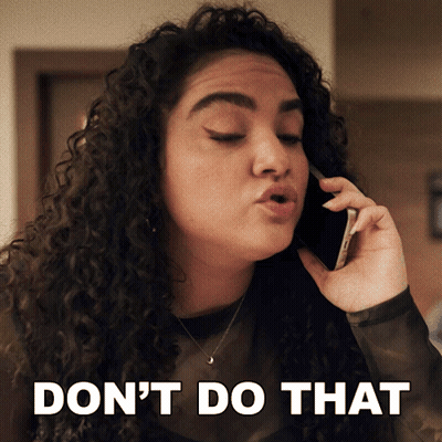 A Woman With Curly Hair Talking On A Cell Phone With The Words " Don 'T Do That " Above Her GIF