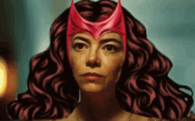 A Woman With Curly Hair Wearing A Red Helmet GIF