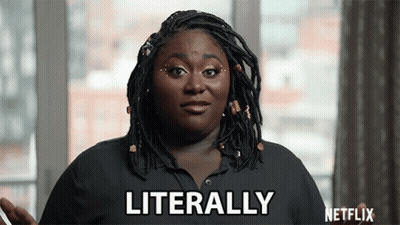 A Woman With Dreadlocks And A Black Shirt Says Literally GIF