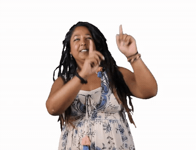 A Woman With Dreadlocks Is Pointing Up With Her Fingers GIF