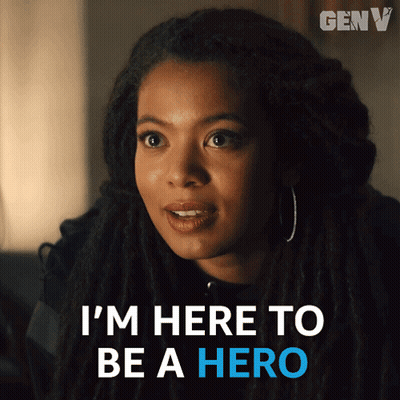 A Woman With Dreadlocks Is Saying " I 'M Here To Be A Hero " GIF