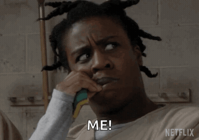 A Woman With Dreadlocks Is Saying Me In A Netflix Ad GIF