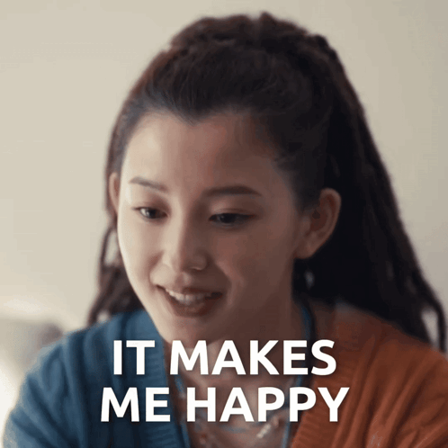 A Woman With Dreadlocks Is Smiling With The Words It Makes Me Happy Above Her GIF