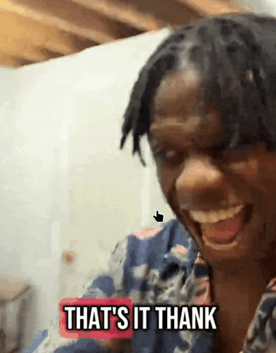 A Woman With Dreadlocks Is Smiling With The Words That 'S It Thank Below Her GIF