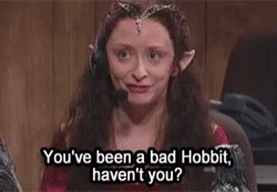 A Woman With Elf Ears Is Wearing A Headset And Talking On A Phone . GIF