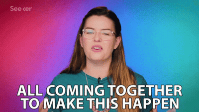 A Woman With Glasses And A Blue Shirt Says All Coming Together To Make This Happen GIF