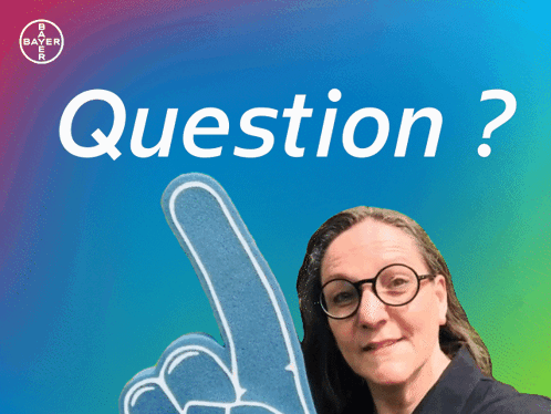 A Woman With Glasses Holds Up A Foam Finger In Front Of A Blue Background That Says Question GIF