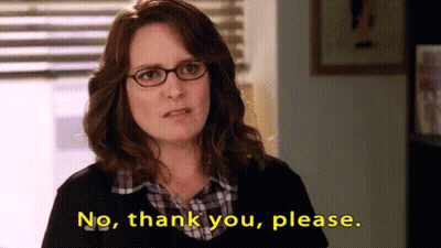 A Woman With Glasses Is Saying No Thank You Please . GIF