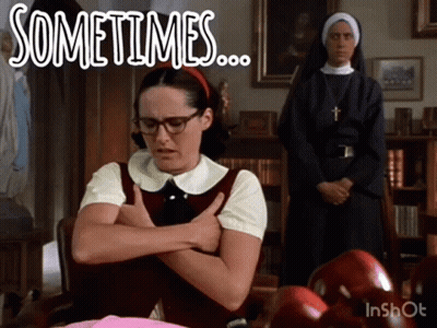A Woman With Glasses Is Sitting In Front Of A Nun And The Words Sometimes Are Above Her GIF