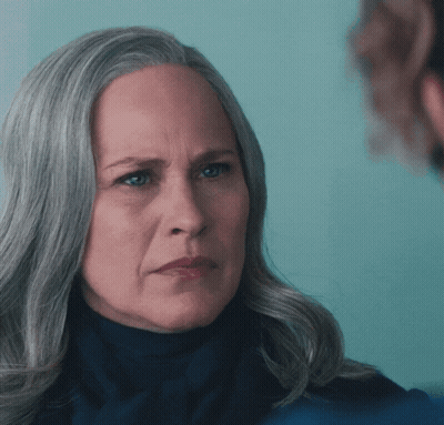 A Woman With Gray Hair And The Words You Are Fired Below Her GIF