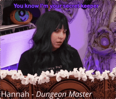 A Woman With Green Hair Is Standing In Front Of A Sign That Says " Hannah - Dungeon Master " GIF