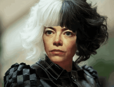 A Woman With Half Black And Half White Hair Is Wearing A Plaid Shirt GIF