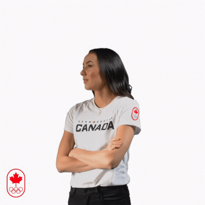 A Woman With Her Arms Crossed Wears A Canada Shirt GIF