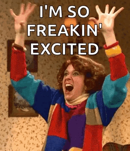 A Woman With Her Arms In The Air And The Words I 'M So Freakin ' Excited GIF