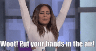 A Woman With Her Arms In The Air And The Words Woot Put Your Hands In The Air Behind Her GIF