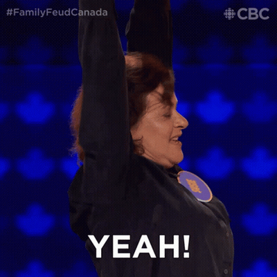 A Woman With Her Arms In The Air Says Yeah On A Blue Background GIF