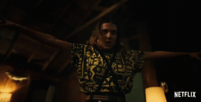 A Woman With Her Arms Outstretched And The Word Netflix On The Bottom GIF