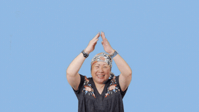 A Woman With Her Arms Outstretched And The Words Happy National Sticker Day Behind Her GIF