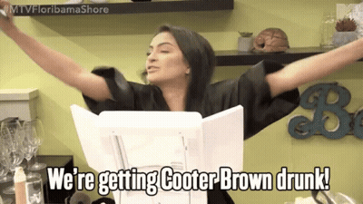 A Woman With Her Arms Outstretched Says " We 'Re Getting Cooter Brown Drunk ! " GIF