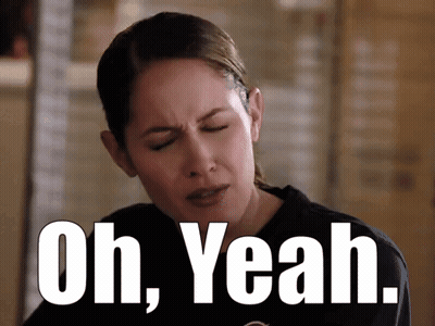 A Woman With Her Eyes Closed And The Words Oh Yeah Written Above Her GIF