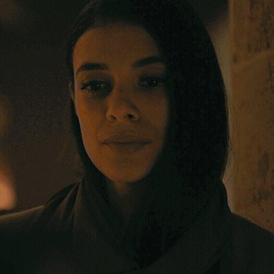 A Woman With Her Eyes Closed And The Words You 'Re Not Leaving Above Her GIF