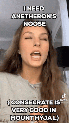 A Woman With Her Eyes Closed Is Making A Funny Face GIF