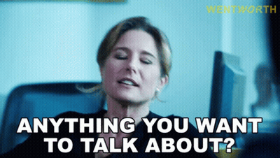 A Woman With Her Eyes Closed Says " Anything You Want To Talk About " GIF