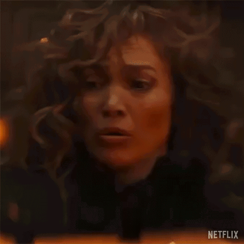 Woman With Windblown Hair Asking What Do I Do GIF