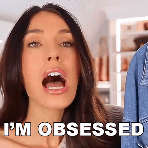 A Woman With Her Mouth Open And The Words I 'M Obsessed Below Her GIF